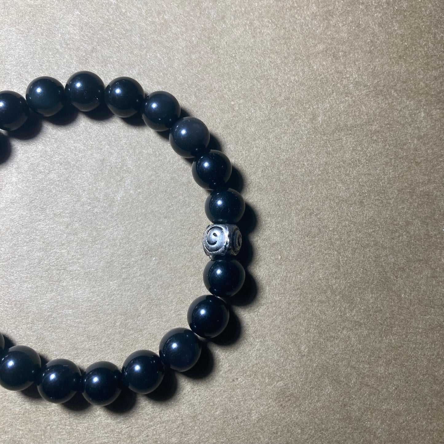 Bracelet Obsidienne Argentée.